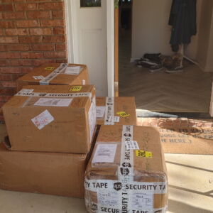 Packages at the door containing 1,000 pairs of Anchor Underwear boxer briefs